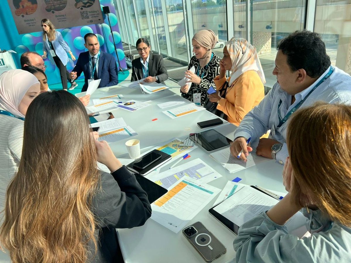 Educators working together at a workshop led by Dr. Salma Waly